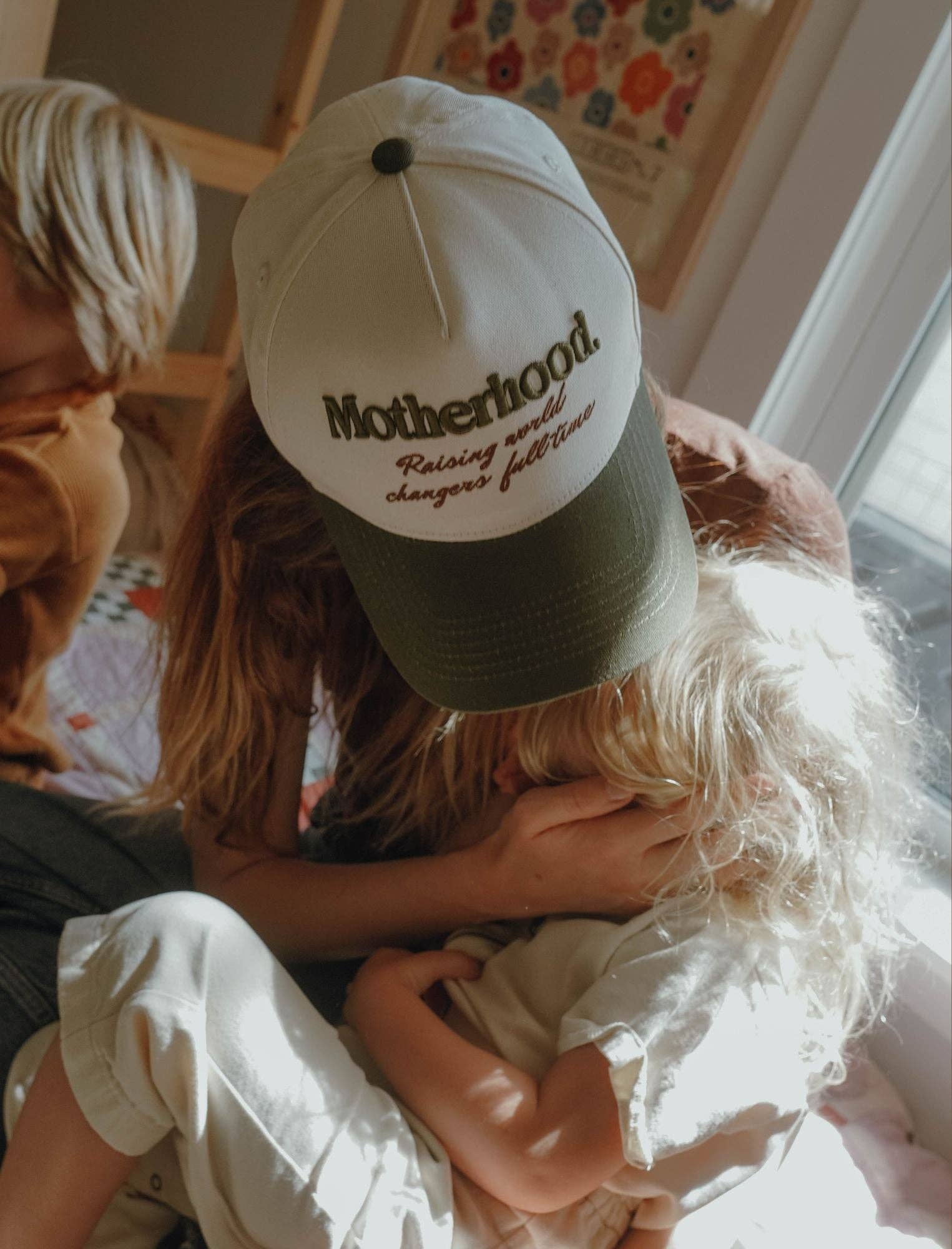Motherhood: Raising World Changer hat Jenessa Wait