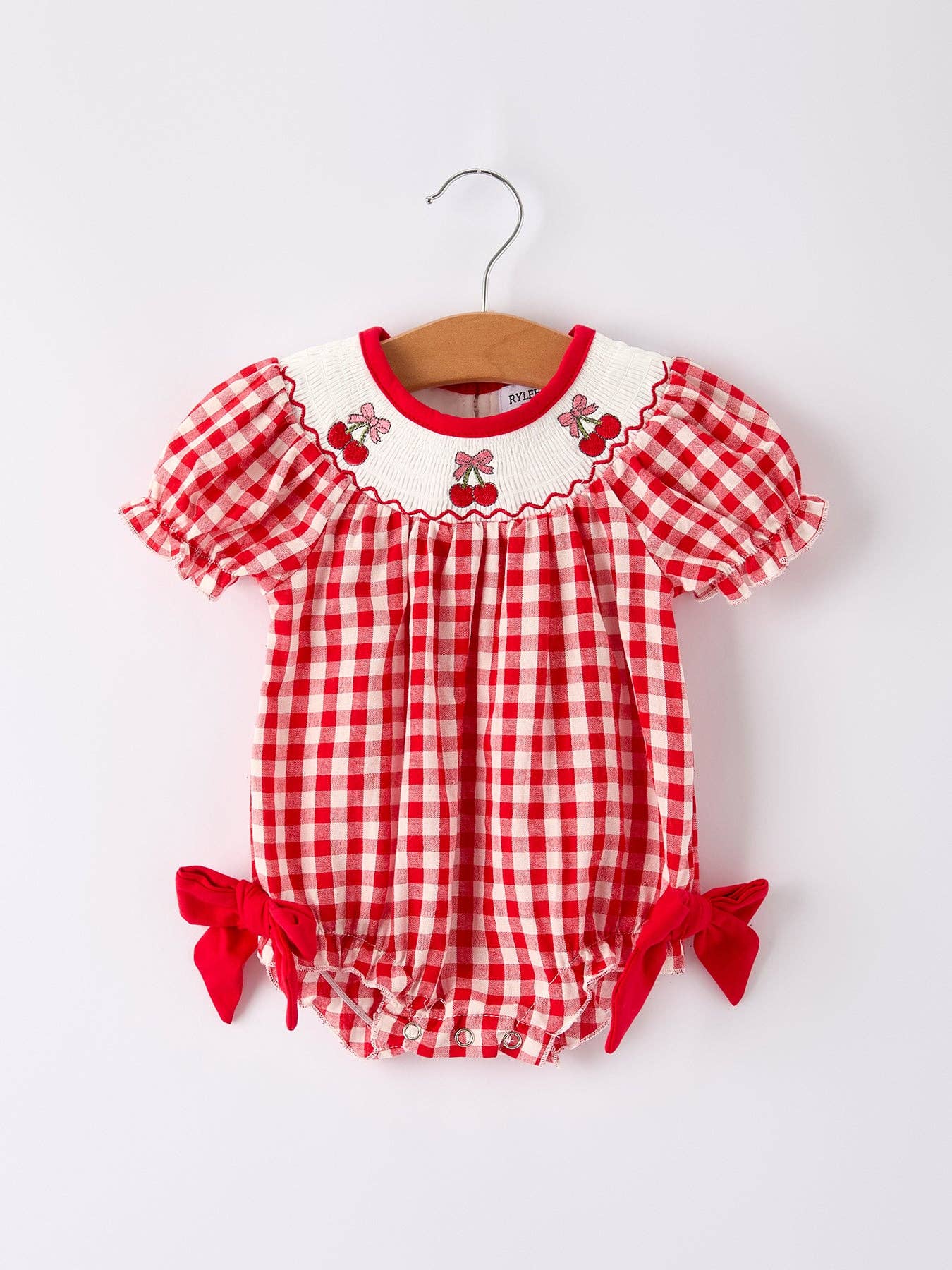 Red Cherry Bow Plaid Smocked Romper Rylee Faith Designs