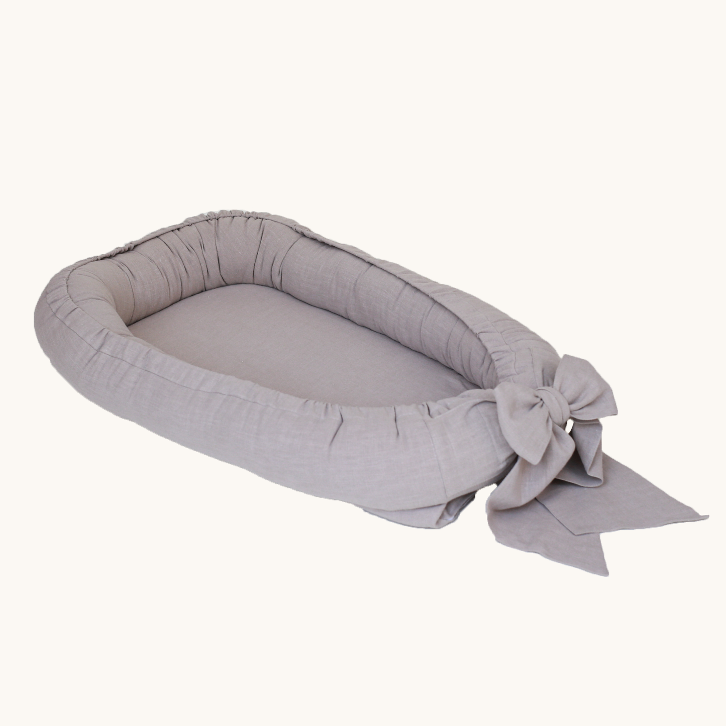 Linen babynest with bow