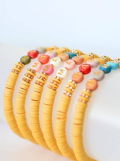 Multi Colored MAMA word beaded stretch bracelet MUSTARD